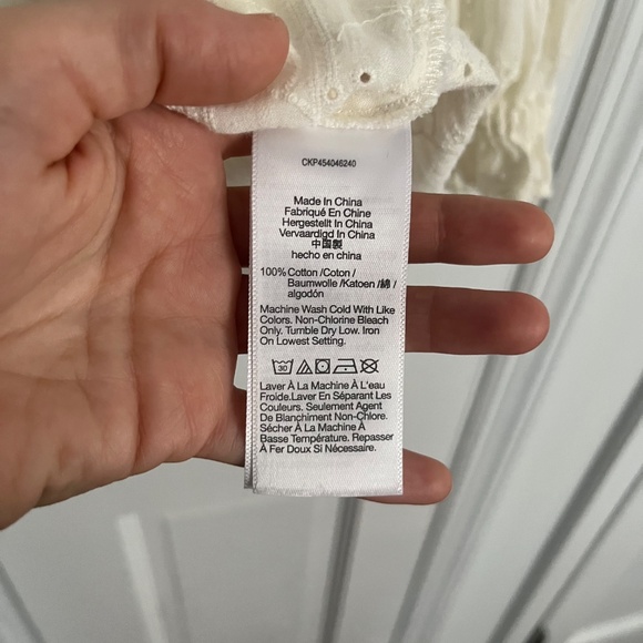 Madewell | Embroidered Eyelet Puff-Sleeve Peplum Wrap Top - Picture 6 of 9